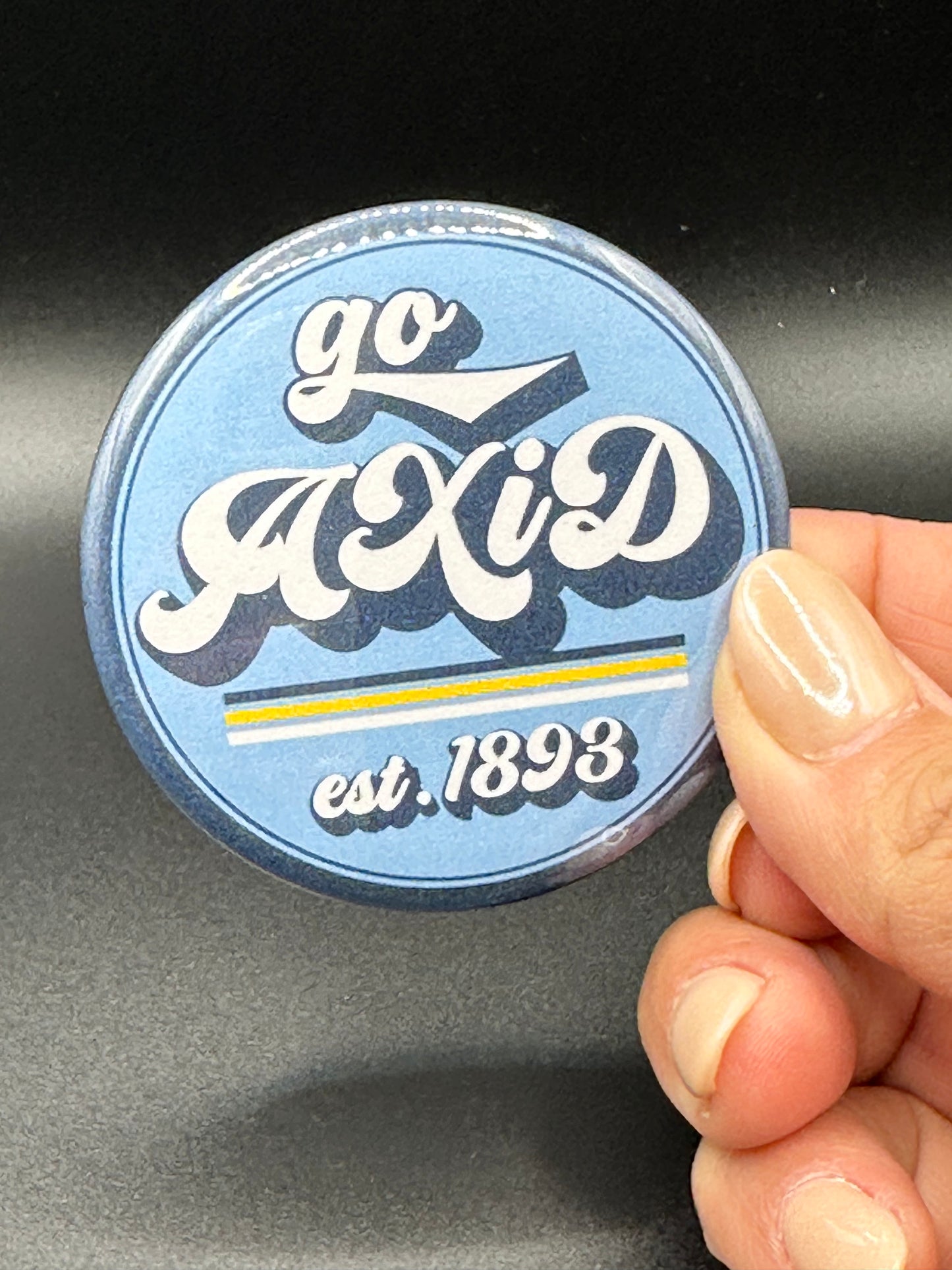 Alpha Xi button